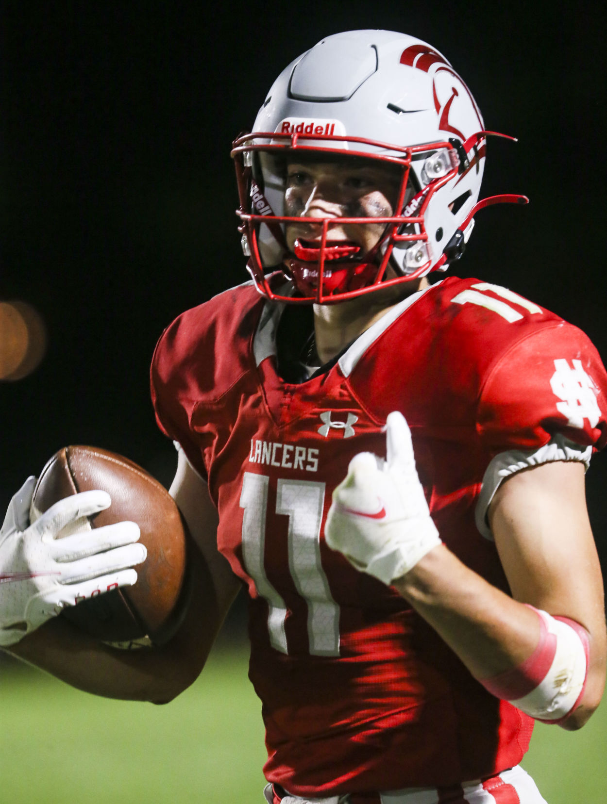 091021-qc-spt-assum-ns fball-25.JPG